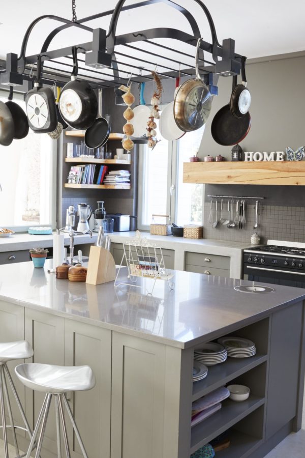 Kitchen Area Of Modern Home Interior With Island And Appliances